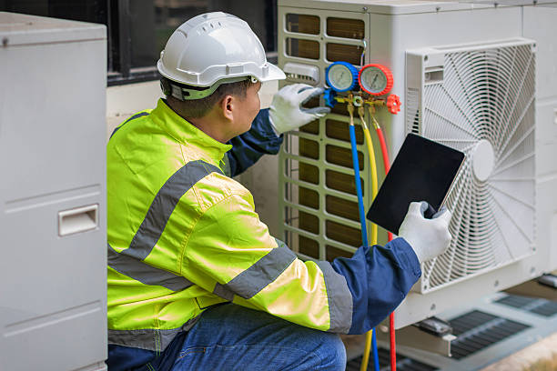 Professional Hvac technician working in Choccolocco, AL